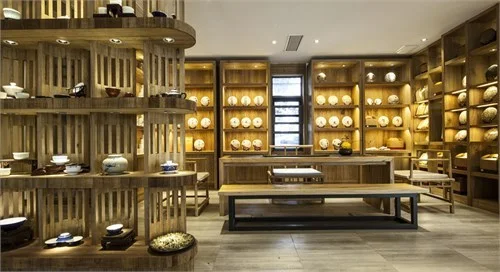 Open display floor organized by timber shelves and a central table