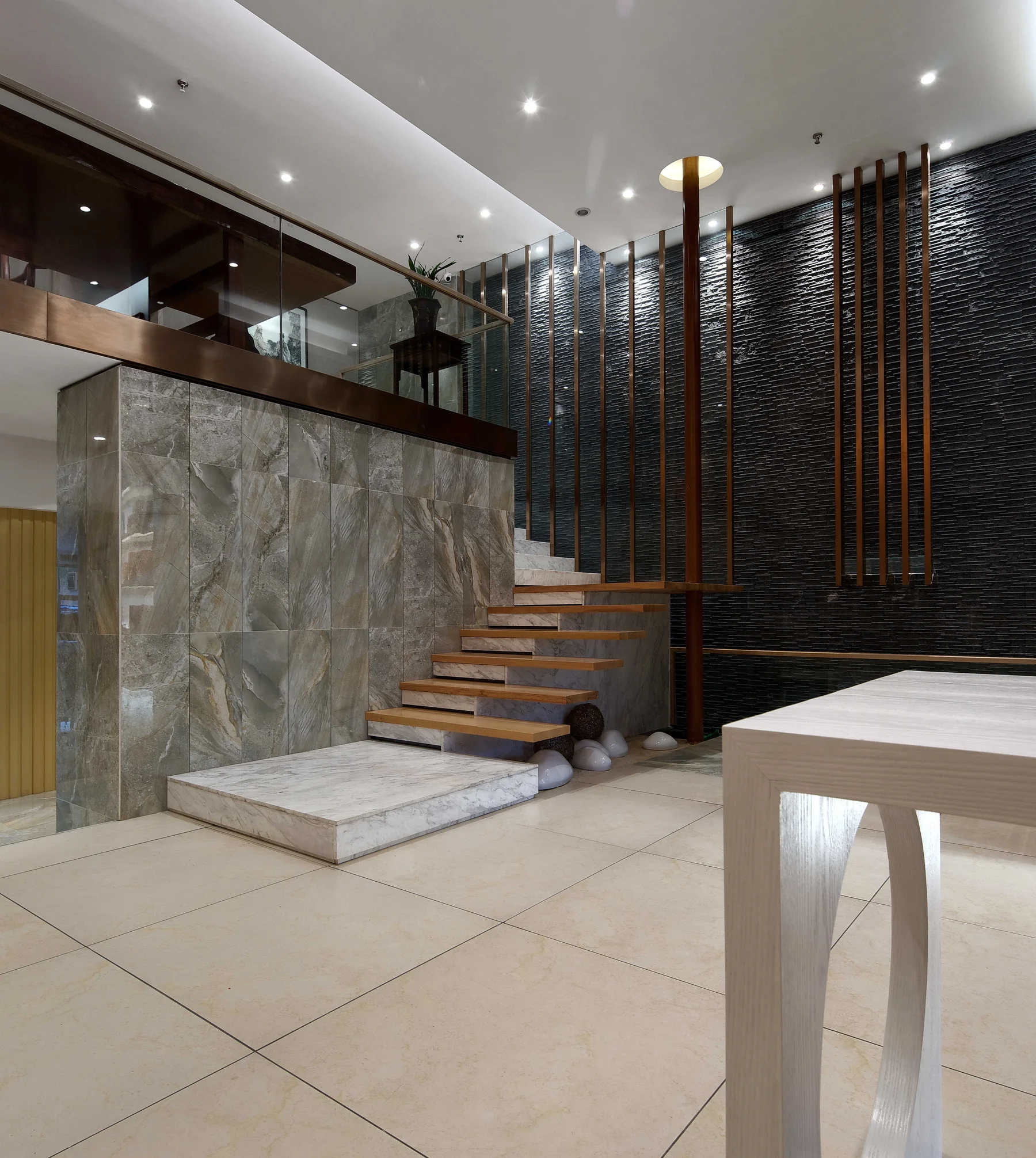 Marble stair and bronze screens inside Nanchang Jingganghong Tea Club