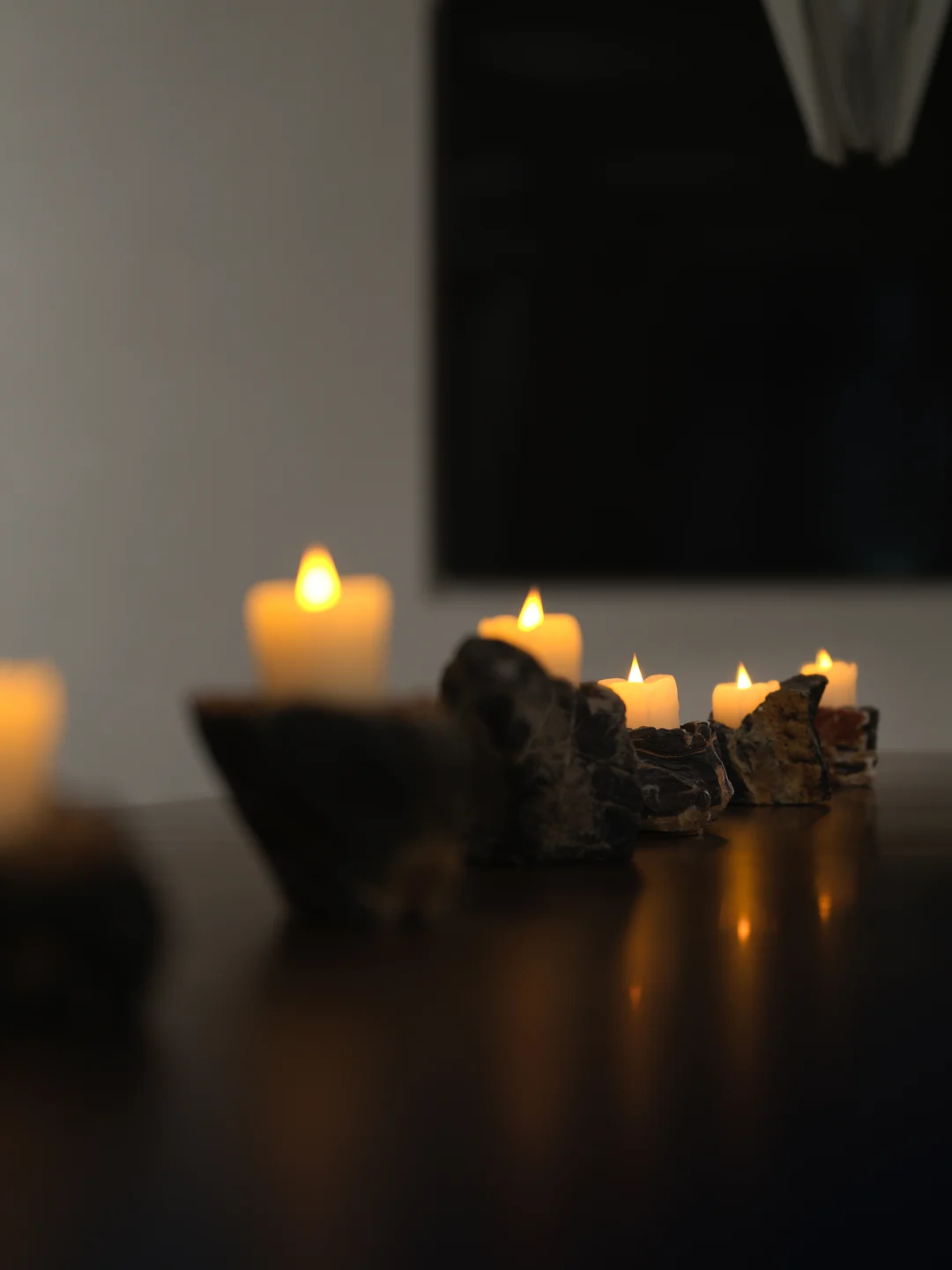 Candle-lit detail in the Wazzor experience space